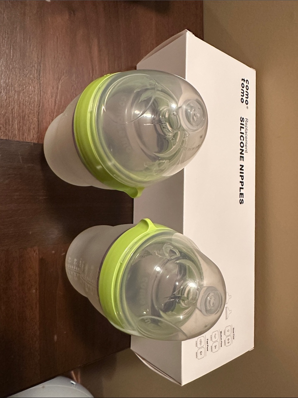 2 8 ounce NEW como tomo bottles + replacement nipples